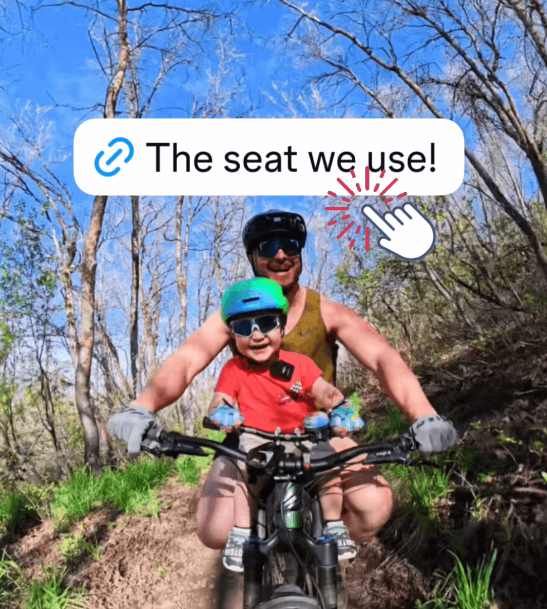 Father and toddler riding bikes on a trail